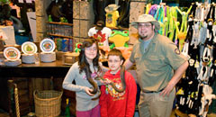 Hold a snake in Kid's Corner at the Rainforest Cafe Niagara Falls